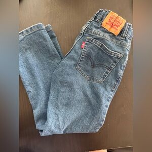 Levi's Blue Denim Jeans with Red Waistband Accent